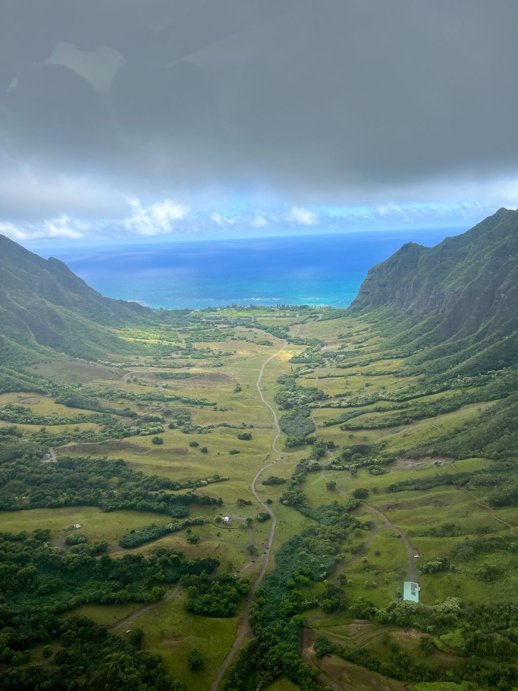 Green valley opening to the ocean